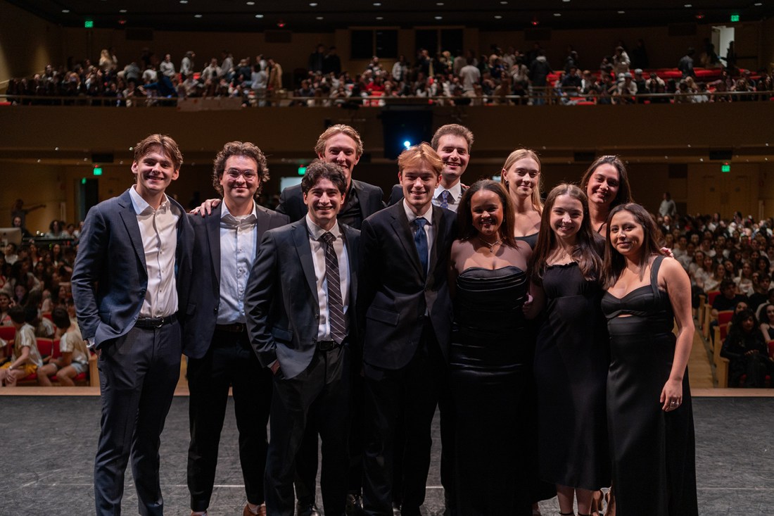 A group of students from Northeastern's Greek life posing next to each other.