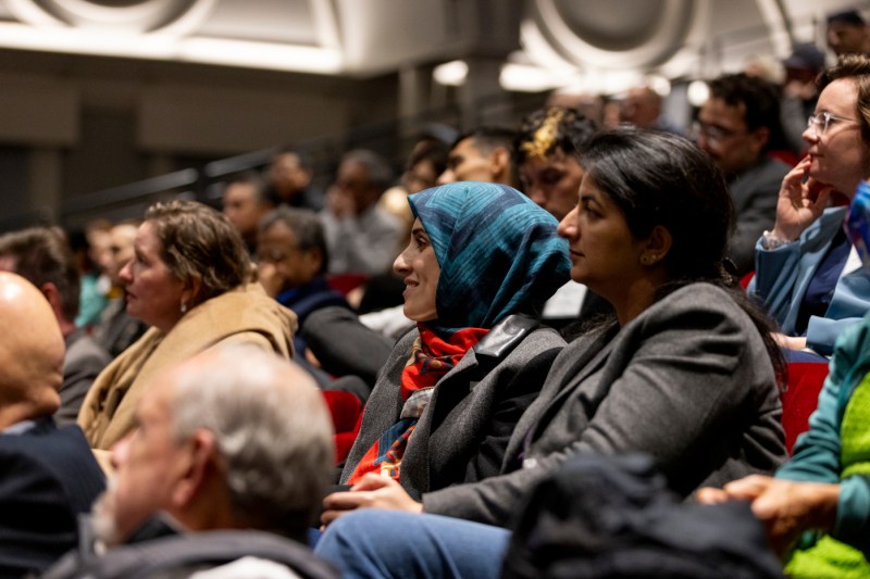 Audience members listening at the Responsible AI in Practice Summit. 