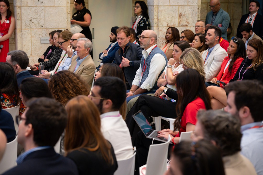 Rows of audience members in the room at the Global Leadership Summit in Miami.