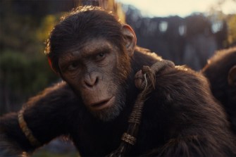 A screen capture of an digital ape from a movie.