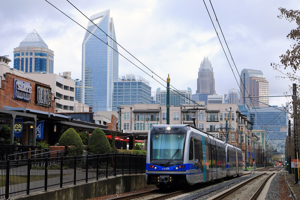 A Rapid Transit vehicle on a rail line going through Charlotte, North Carolina.