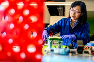 Wei Xie working in a lab.