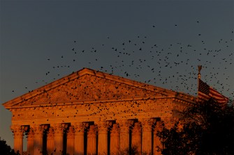 The Supreme Court building seen at sunset.