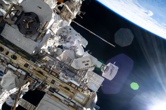 A flight engineer working outside the International Space Station.