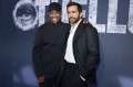 Denzel Washington (left) and Jake Gyllenhaal (right) posing for photos.