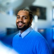 Smiling headshot of Taiji Slaughter