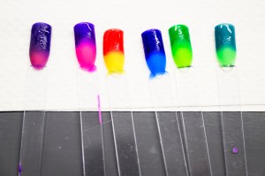 Rows of colorful cosmetics in a lab.