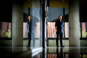 Safa Jamali standing inside a hallway.