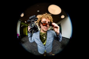 A portrait of Cam Sleeper, a Northeastern videographer.