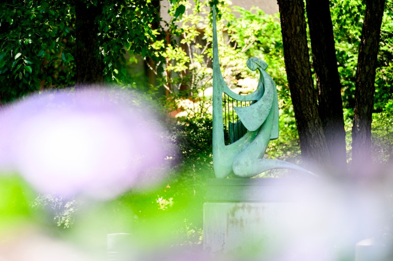 A side view of the David Playing The Harp sculpture.