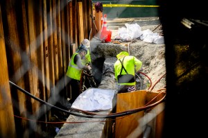 Construction crews work on the underground steam vent infrastructure on Northeastern's Boston campus.