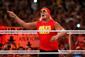 Wrestling icon Hulk Hogan riling up the crowd in the ring.
