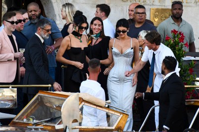 Kylie and Kendall Jenner in formal gowns leaving the wedding of Jeff Bezos and Lauren Sanchez.