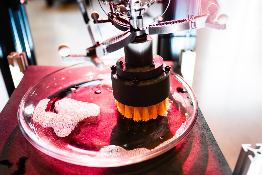 A scrubber wiping down a surface. 