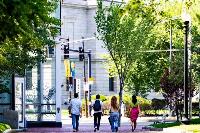 People walk through the Northeastern Boston campus.