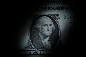 An artsy depiction of the one dollar bill, heavily shaded at the corners.