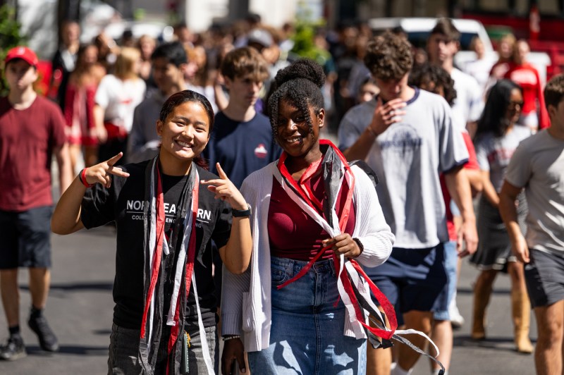 Students at Fall Fest smile for a photo.