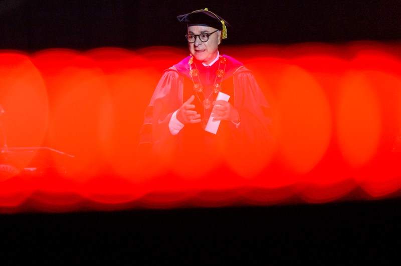 President Aoun speaks on stage at convocation.