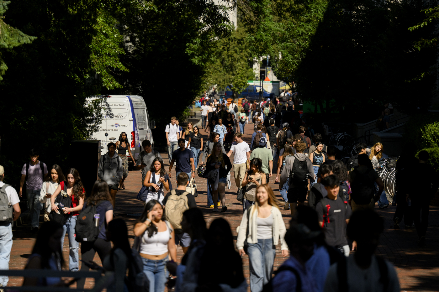 Students walk through the Boston campus.