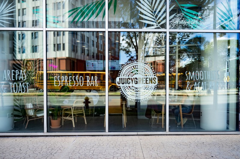 The exterior of the Juicygreens juice bar.