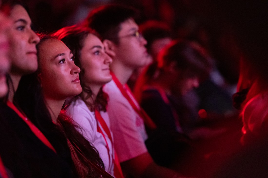 Students listening intently to presenters during the London Convocation.
