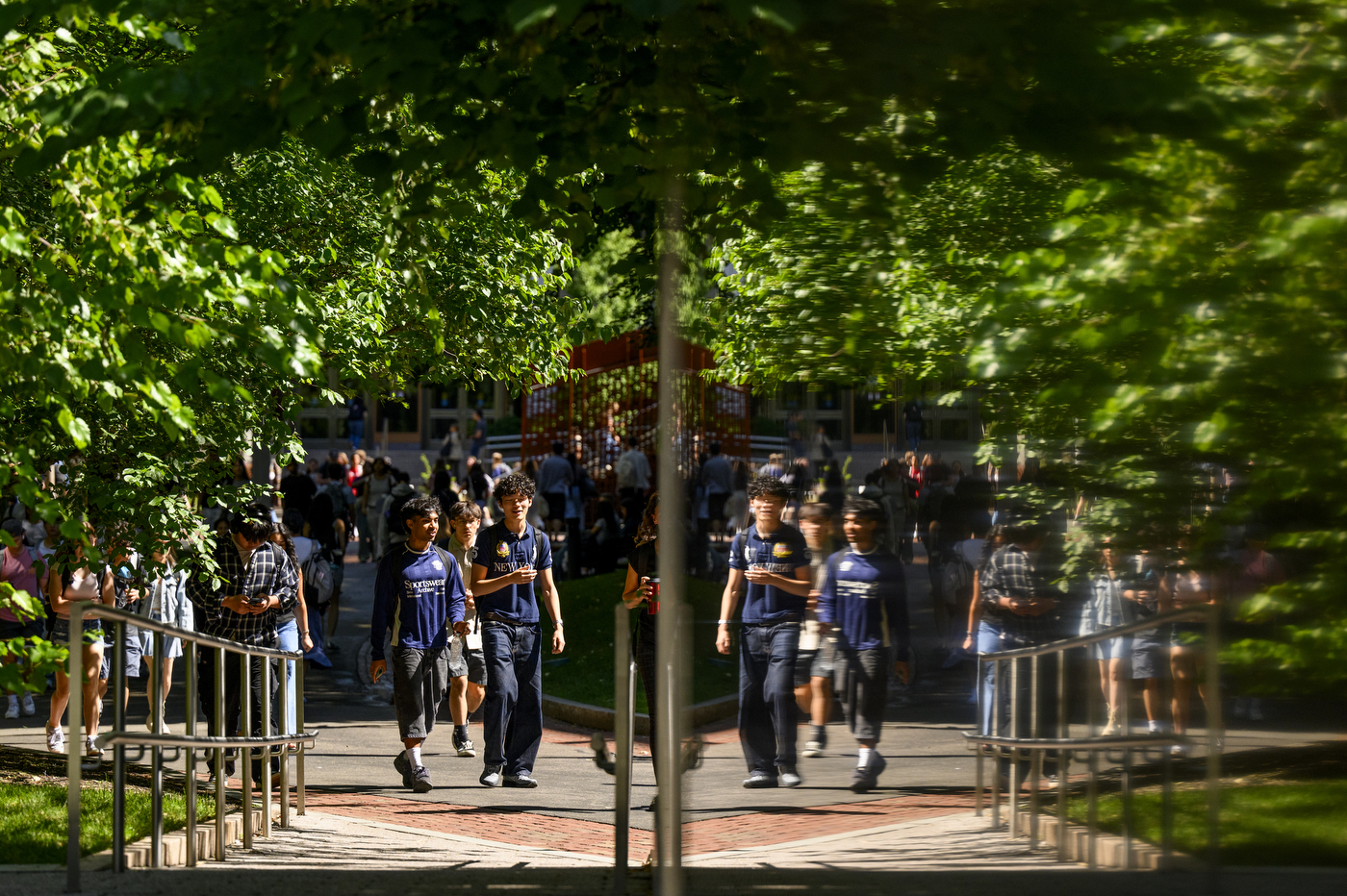 Students walk through campus.