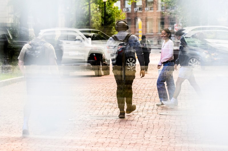 Students walk through campus.