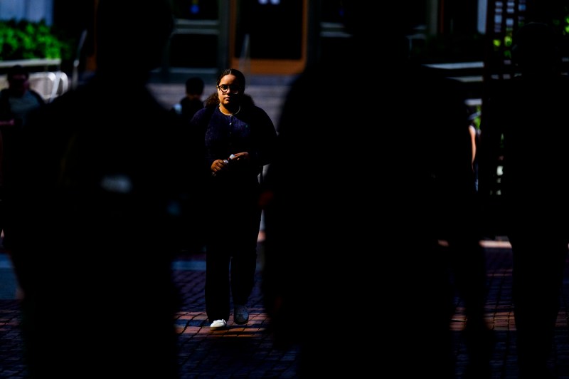 Students walk through campus.