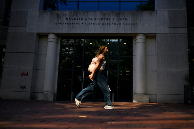 A student walks through campus.