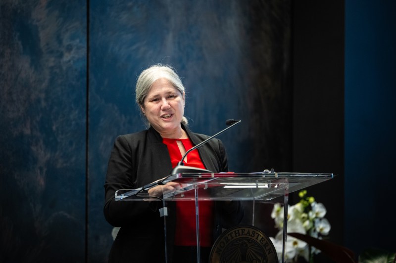 Beth Winkelstein speaks at a podium.