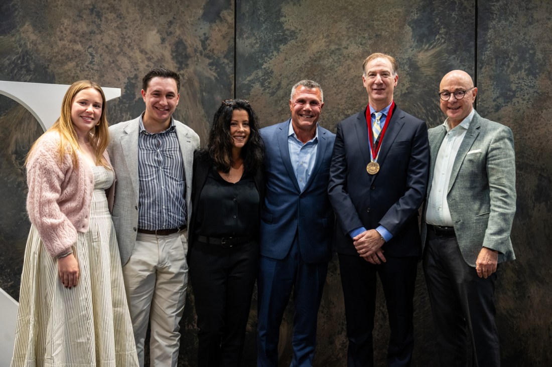 Charles Hillman, President Aoun, Todd Manganaro and members of the Manganaro family pose for a photo.