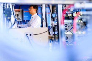 Shang Liu, assistant professor of civil and environmental engineering, depicted operating the Air Quality Mobile Lab.