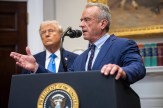 Health and Human Services Secretary Robert F. Kennedy Jr. speaks while President Donald Trump looks on during announcements on autism in the Roosevelt Room.