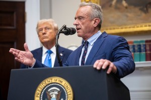 Health and Human Services Secretary Robert F. Kennedy Jr. speaks while President Donald Trump looks on during announcements on autism in the Roosevelt Room.