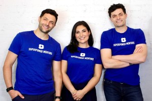 A photo of two men and one woman wearing blue shirts that say "Superpower Mentors."