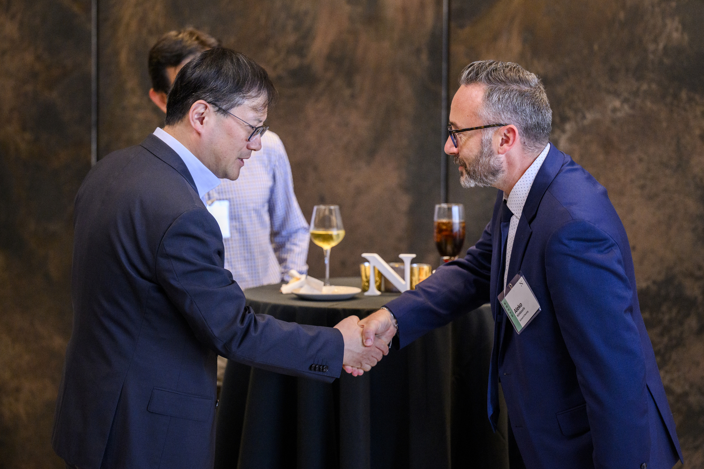 New Northeastern Faculty Get Warm Rooftop Welcome at EXP