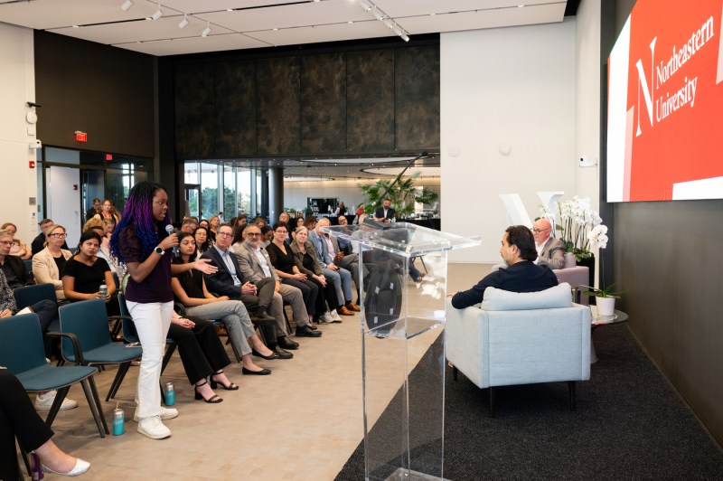 A student asks a question during Northeastern’s fireside chat with General Catalyst CEO Hemant Taneja in EXP on Oct. 6, 2025.