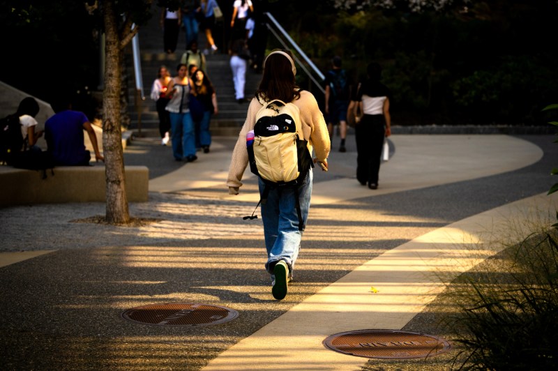 Students walk across the Boston campus.