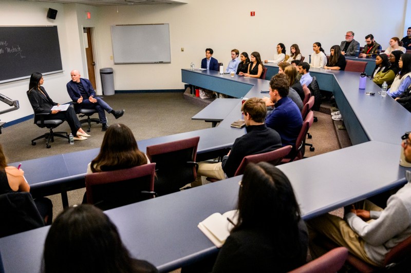 Students listen to Michael Miebach speak.