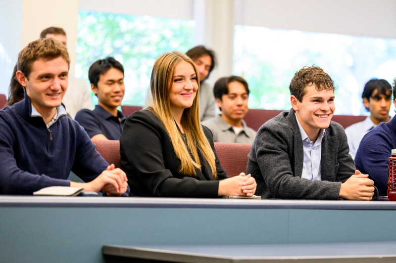 Students listen to Michael Miebach speak.