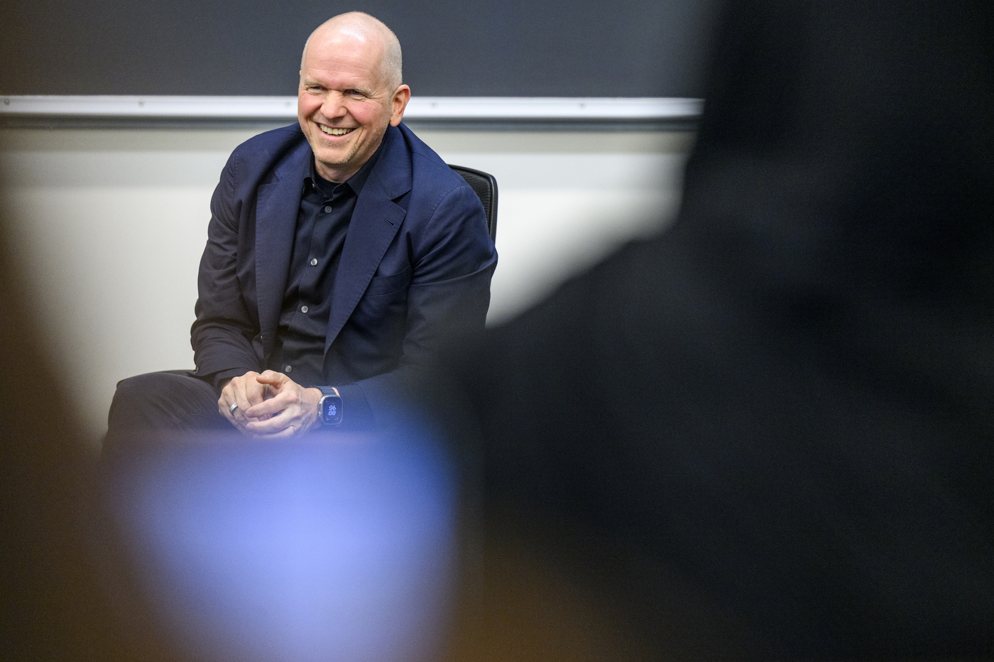 Michael Miebach speaks to a room full of students.