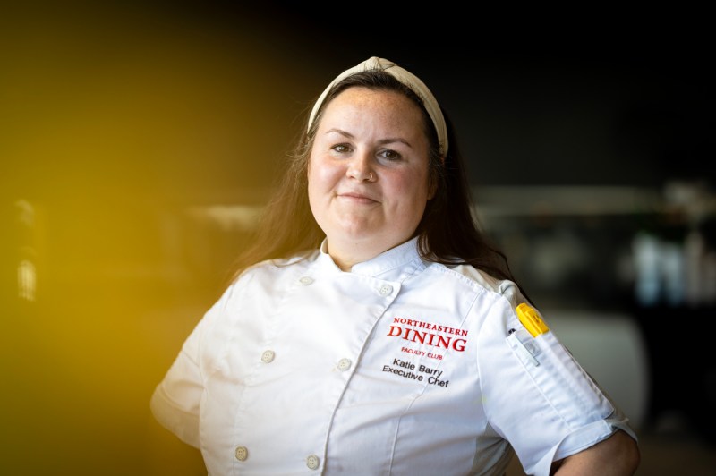 Katie Barry, dressed in her chef attire, poses for a headshot.