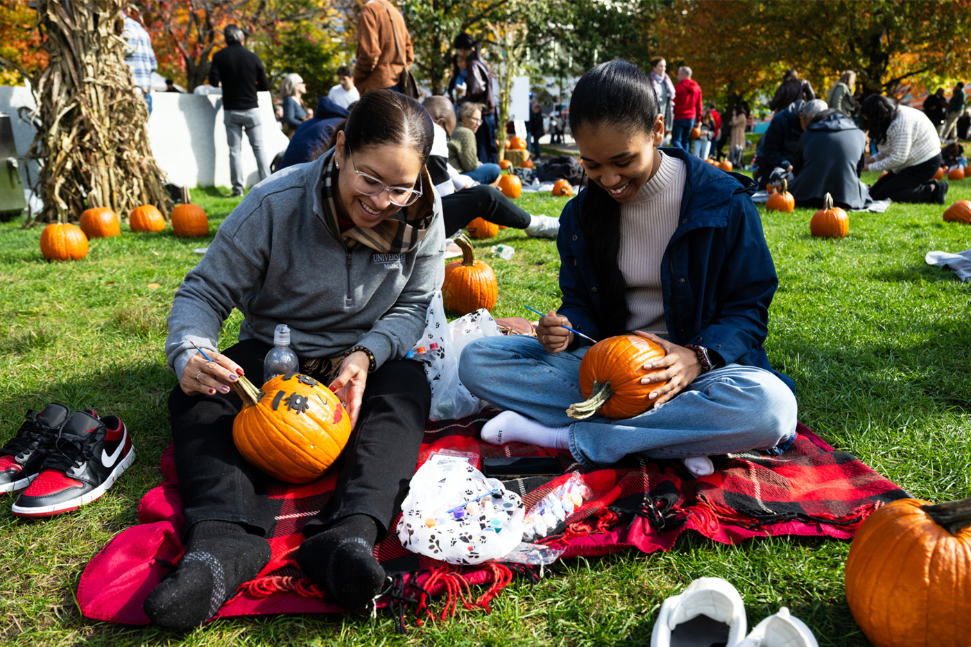 Scarecrows walking on stilts, pumpkins on the quad and neck tattoos on Northeastern’s Boston campus