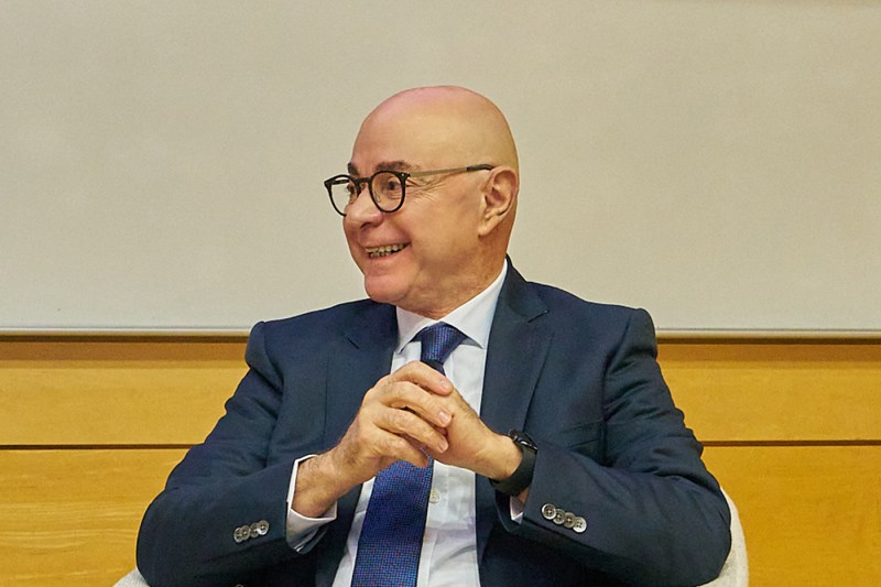 Joseph E. Aoun smiles while in conversation on stage at the Times Higher Ed Global AI Summit in Toronto.