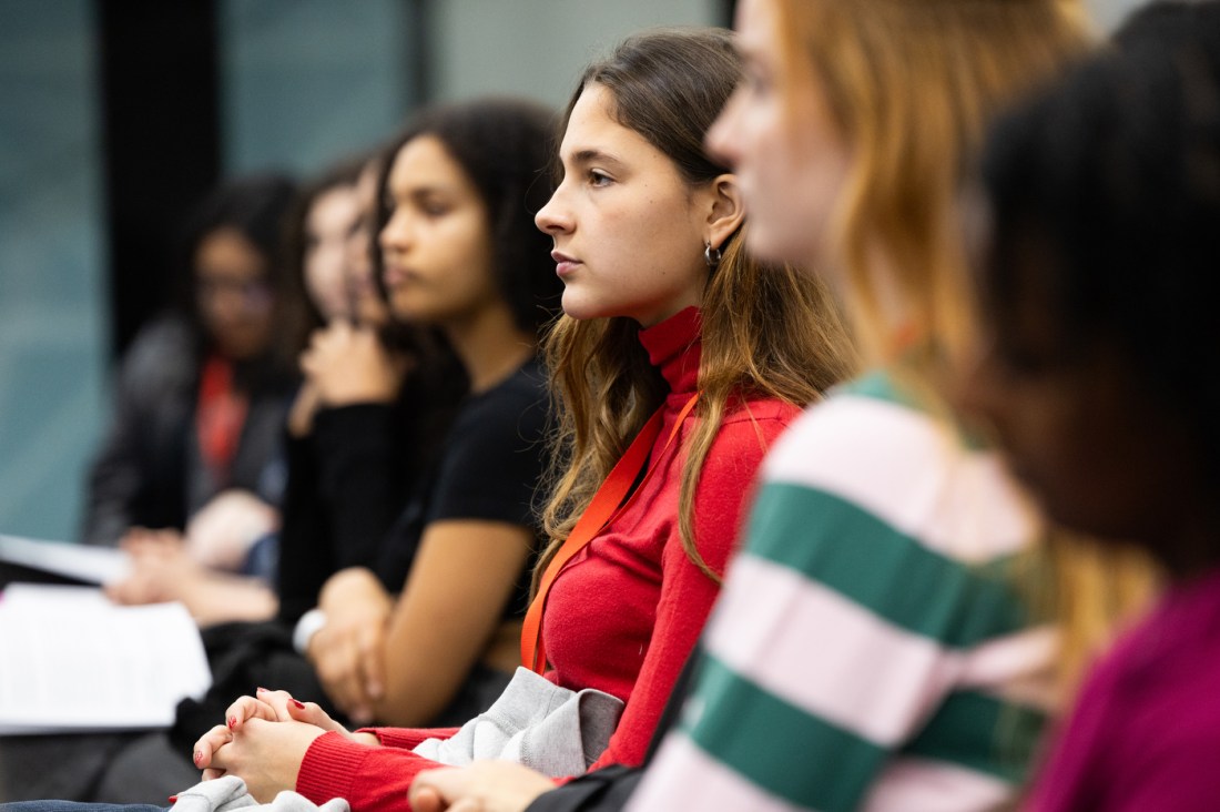 Several female audience members seated and listening at Northeastern University London’s “Night at the Museum” event celebrating Black History Month.