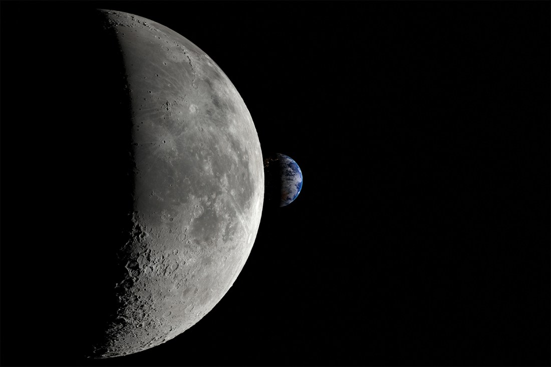 An image of the moon, half-cloaked in shadow, with the Earth way off in the distance.