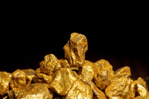 Gold rocks on a black background.