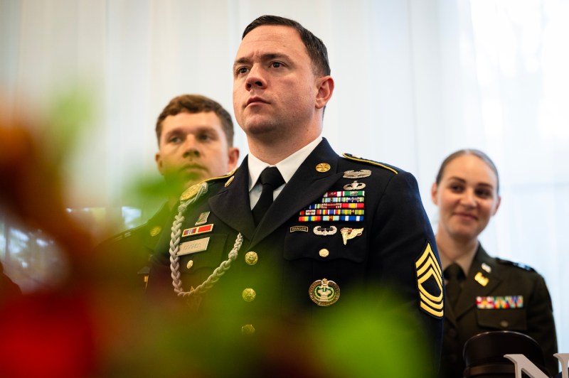 A man in military dress uniform stands at attention during the 2025 Veterans Day Ceremony. 