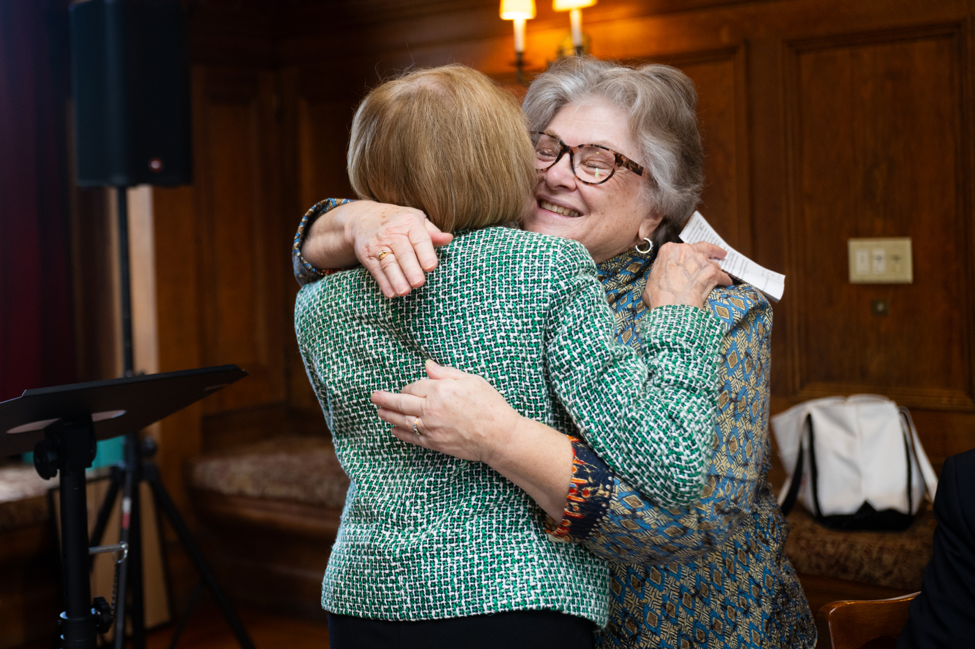 Deanna Jantzen embraces Corinne Reppucci at the luncheon event at the Endicott Estate.