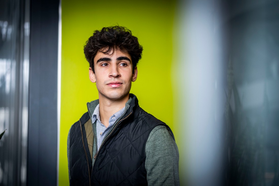 portrait of Benjamin Koobatian with lime green background